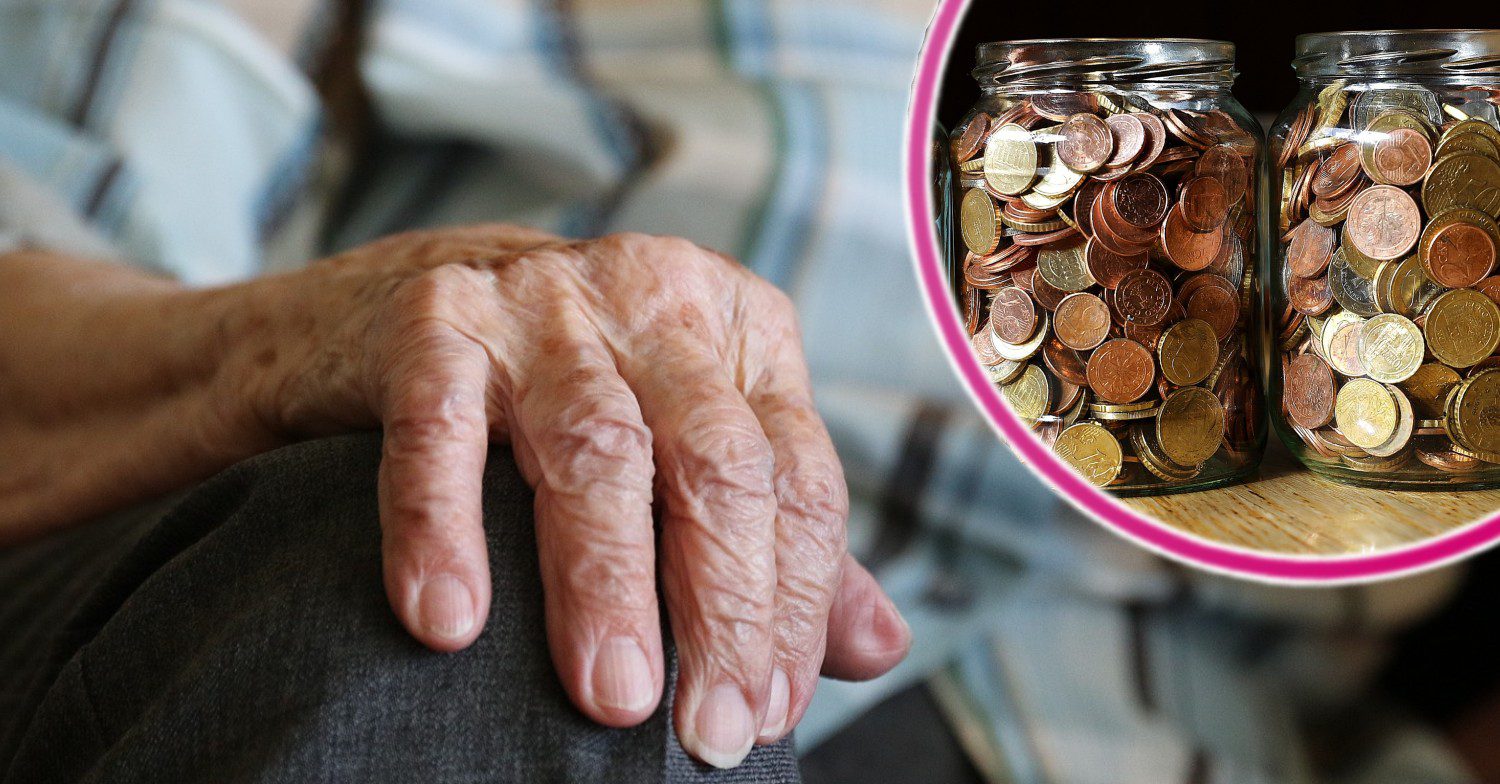 An old person's hand with tins of coins