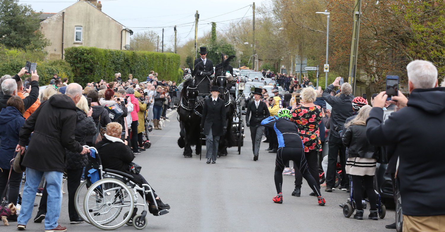 Paul O'Grady funeral procession as coffin passes through locals