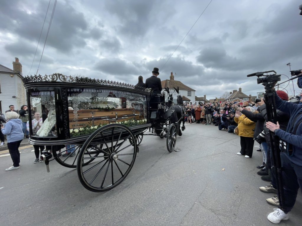 Paul O'Grady's coffin and funeral procession