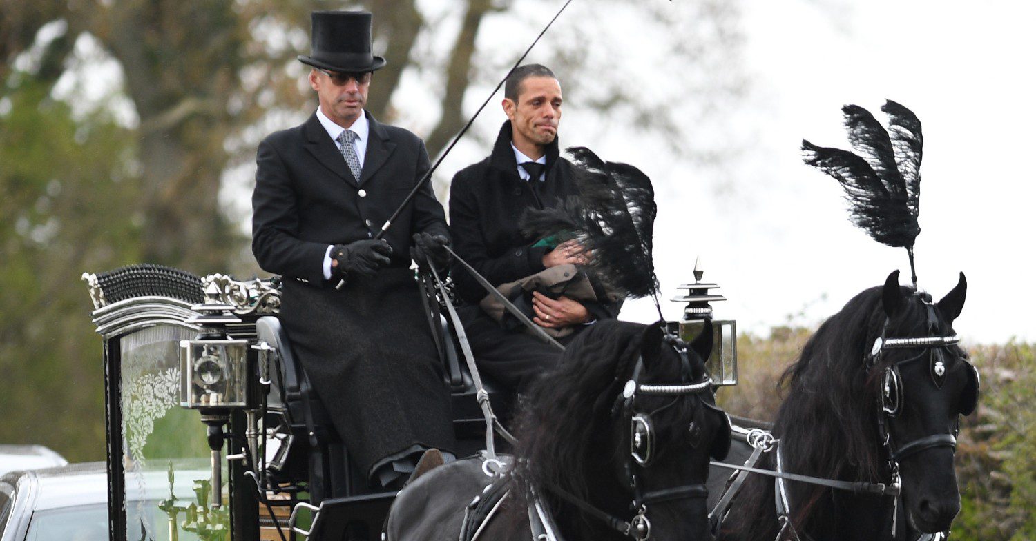Paul O'Grady funeral procession as husband Andre looks emotional
