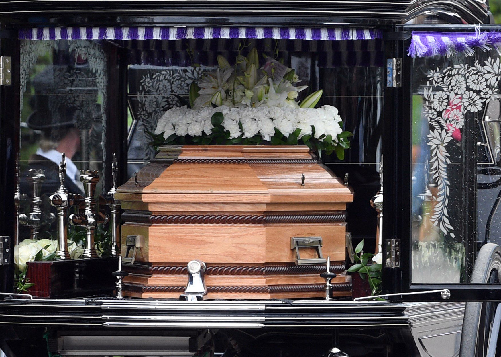 Paul O'Grady coffin during procession