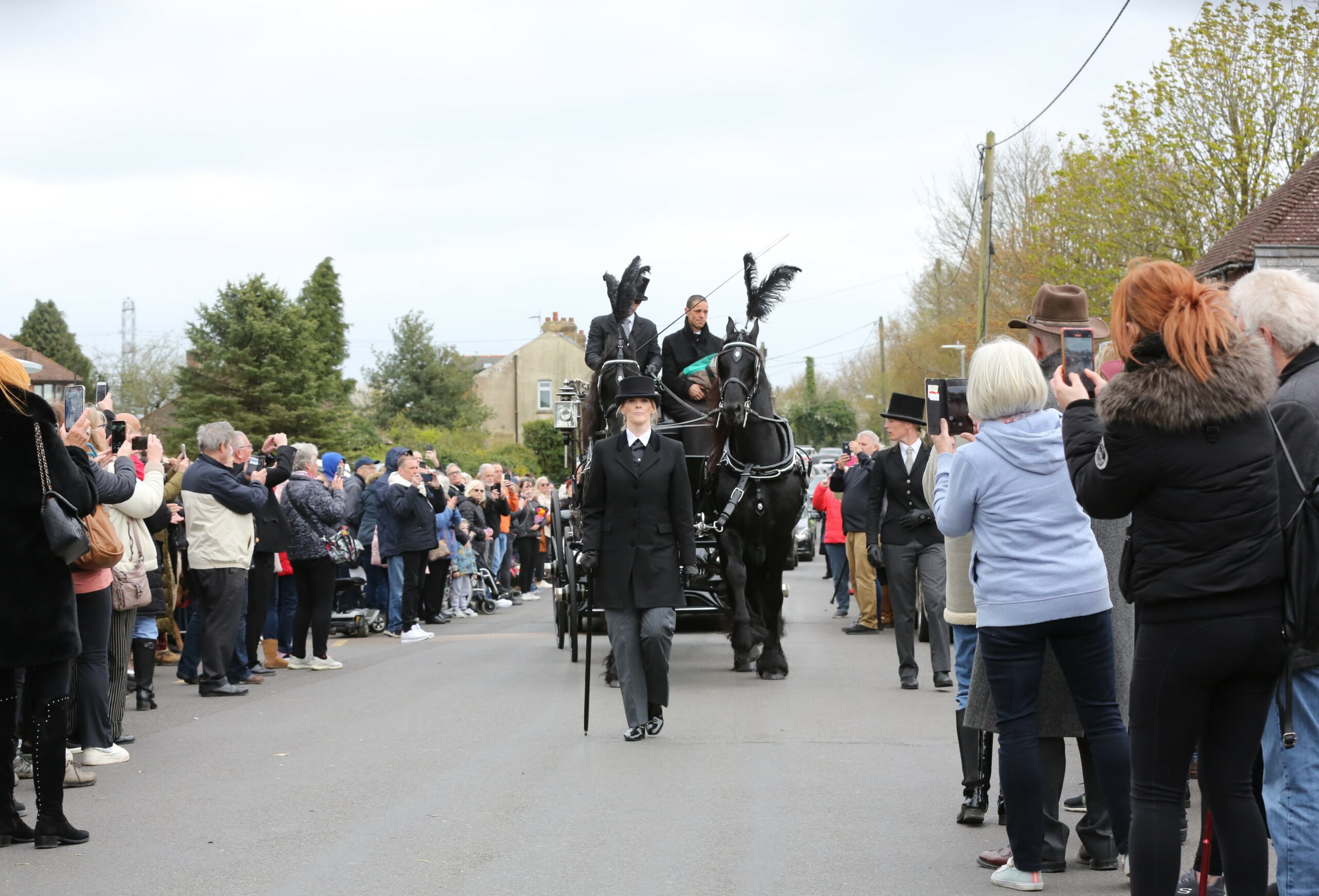 Paul O'Grady funeral procession as crowds gather