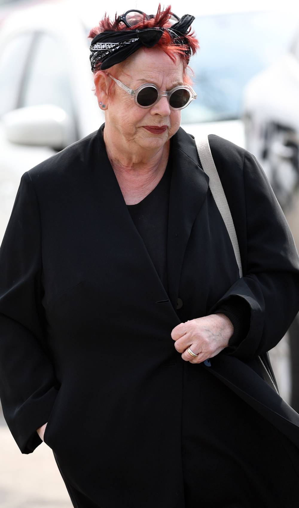 Jo Brand looks downwards at Paul O'Grady funeral