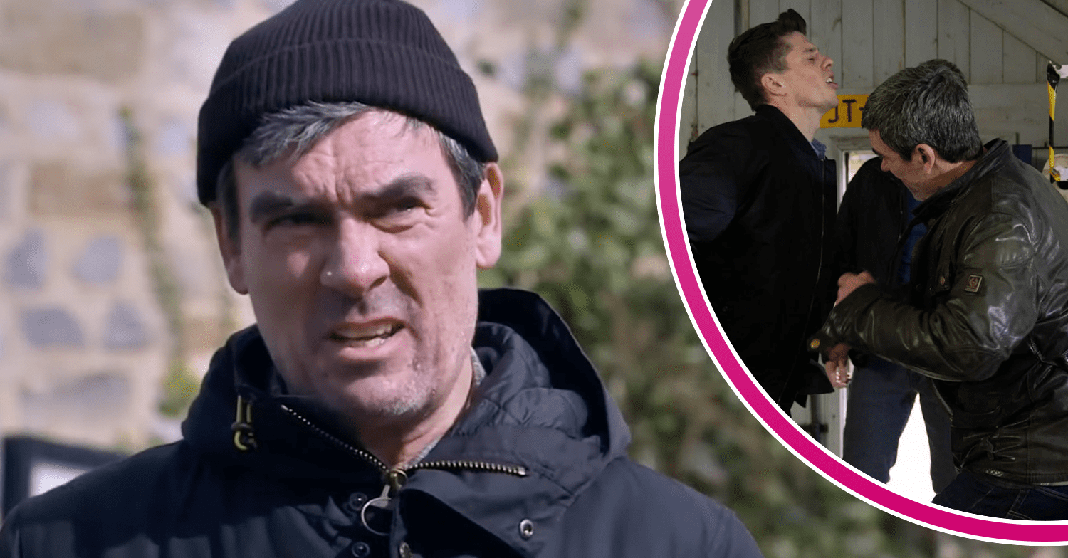 Cain wearing a hat in Emmerdale and fighting in the garage