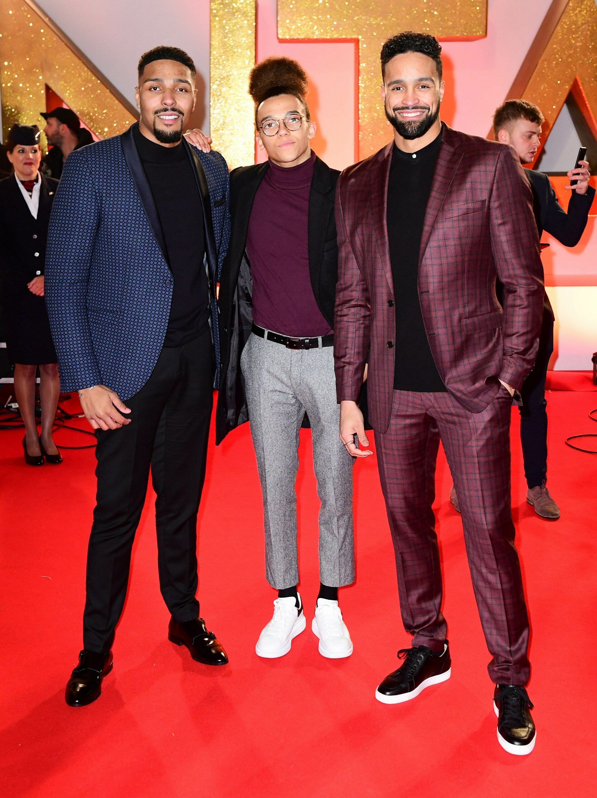 Diversity stars Ashley Banjo, Perri Kiely and Jordon Banjo smile