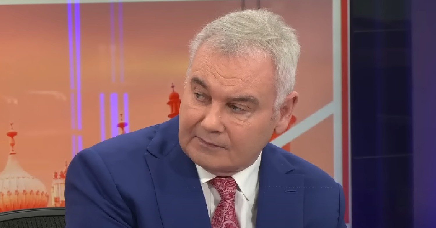 Eamonn Holmes talking and looking to the side on GB News