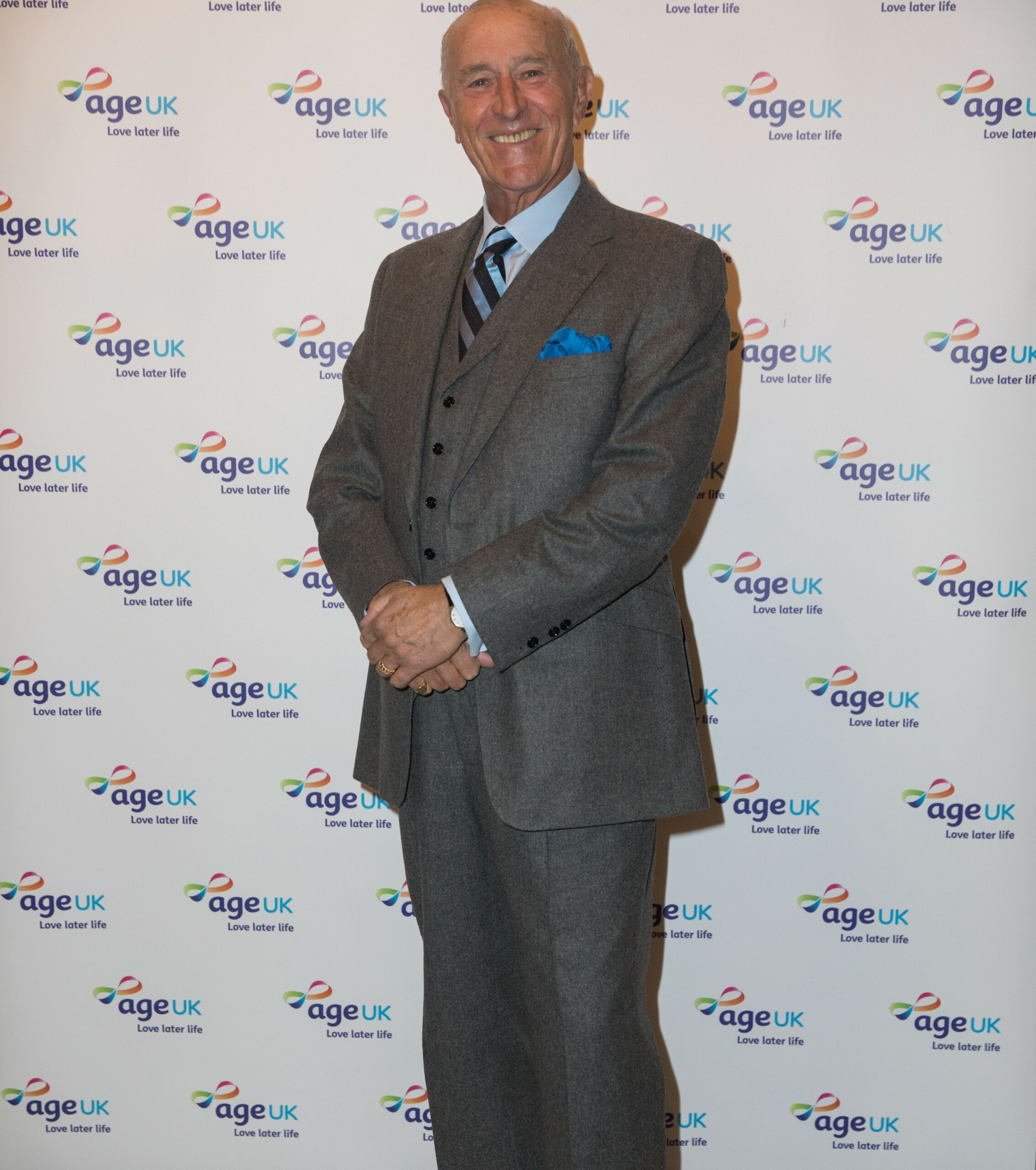 Len Goodman smiling in suit