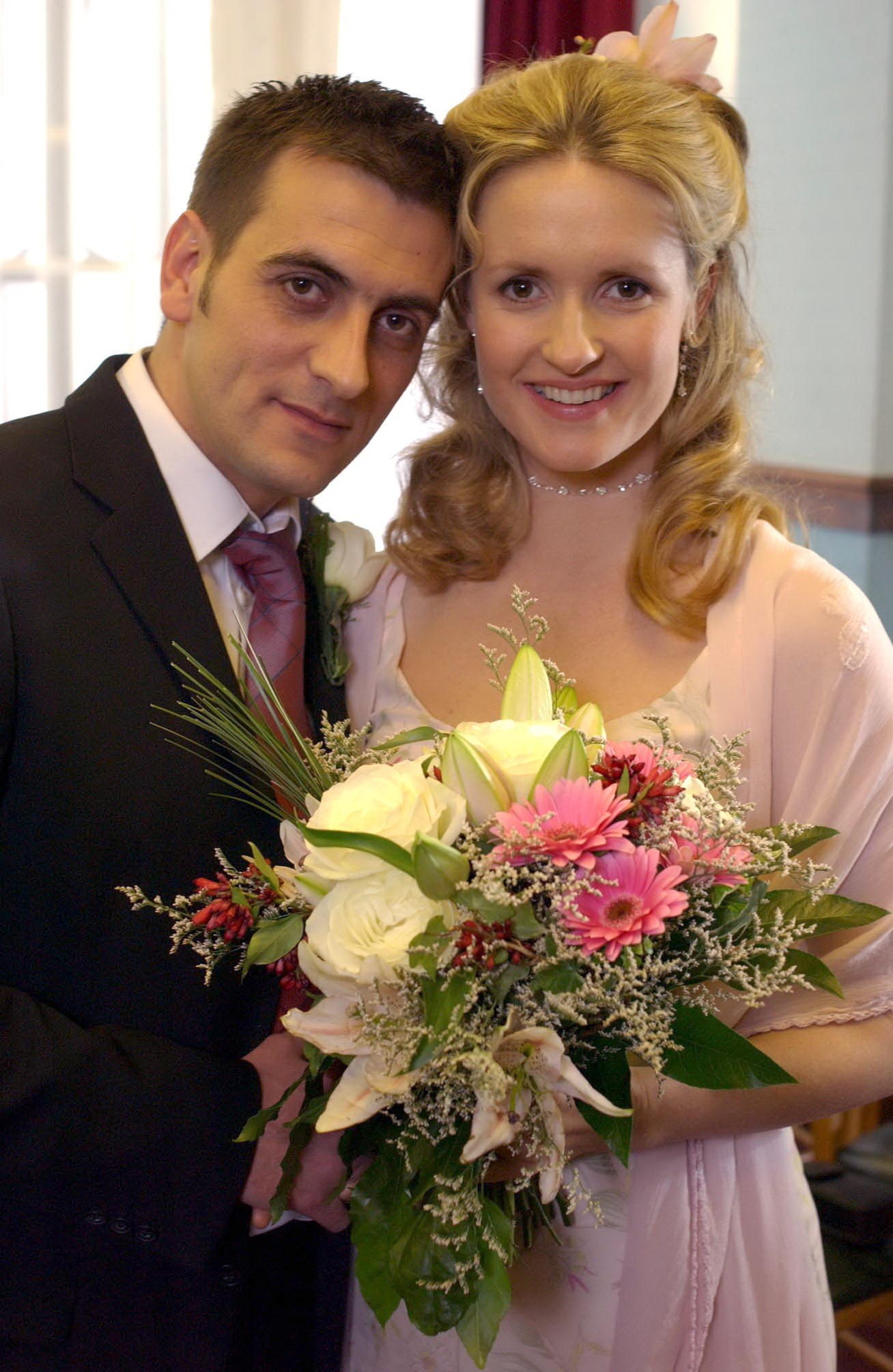Lucy and Peter Barlow on their wedding day in Coronation Street