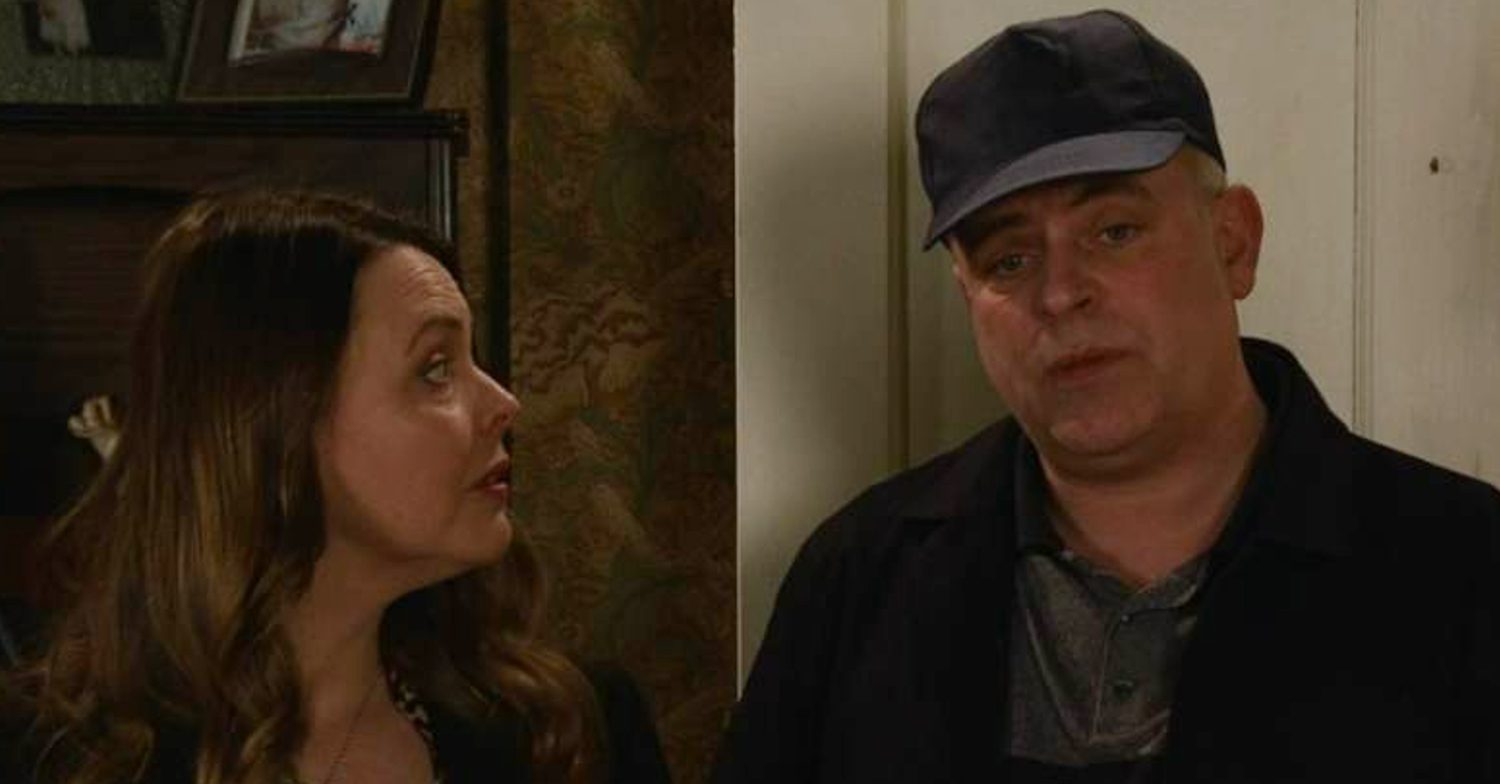 Coronation Street's Steve is wearing a hat whilst Tracy is looking at him