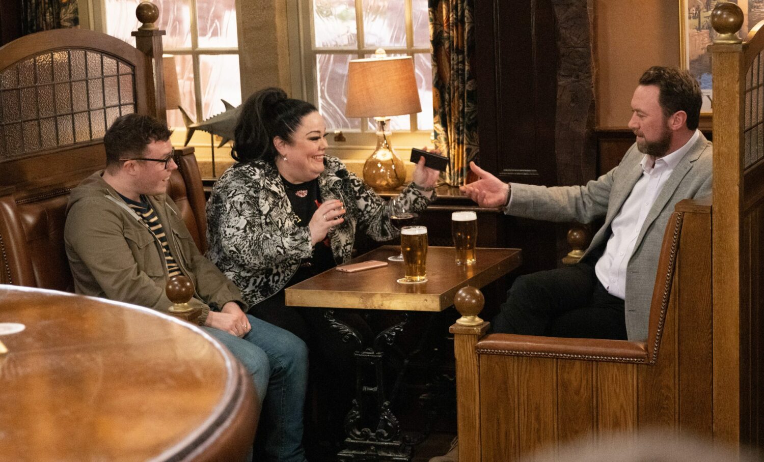 Emmerdale's Mandy, Vinny and Liam are having a drink in the Woolpack