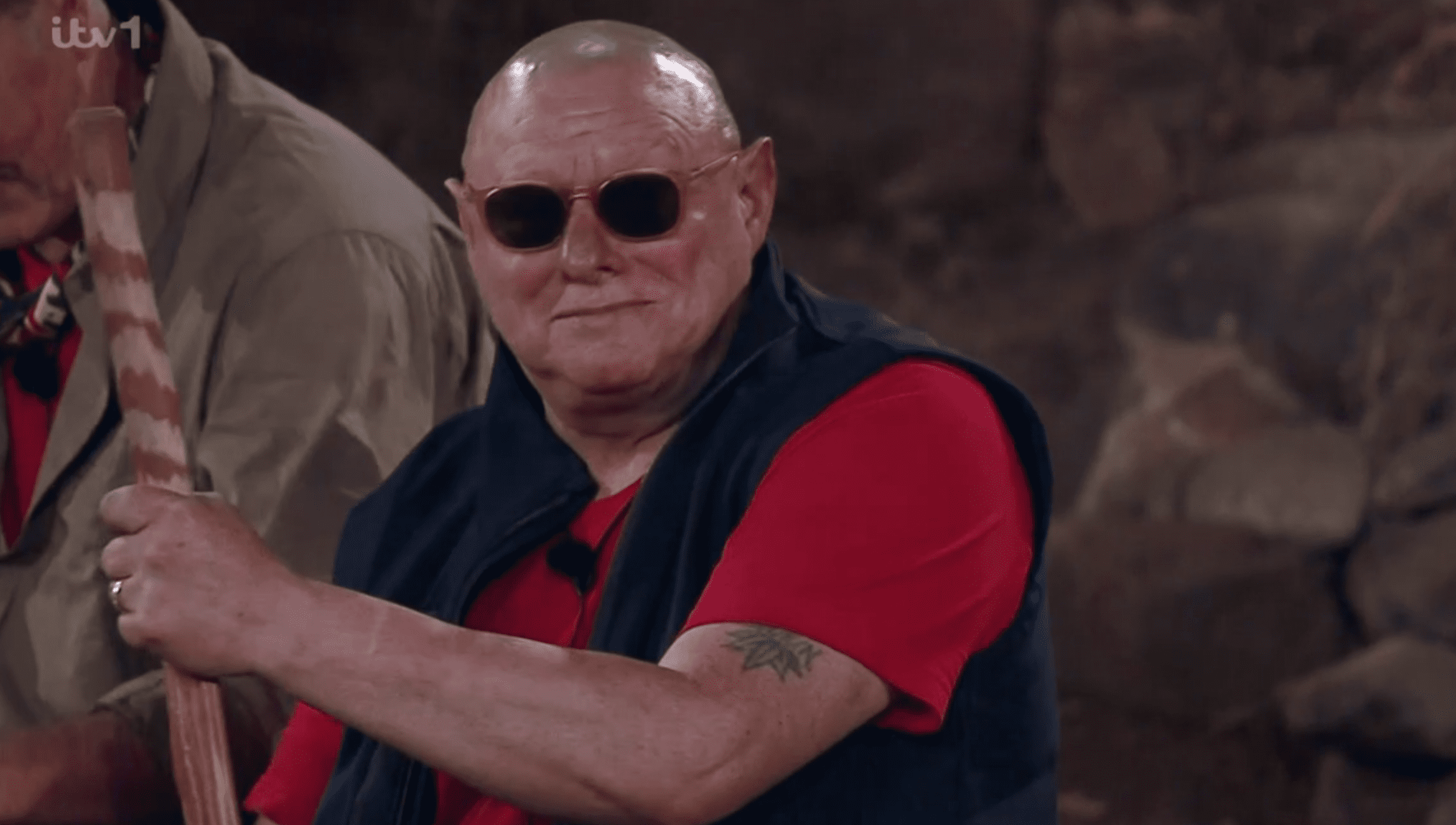 Shaun Ryder wearing sunglasses in I'm A Celebrity