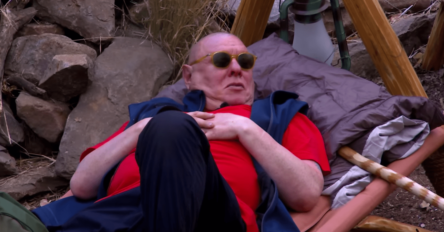 Shaun in the camp lying on a bed