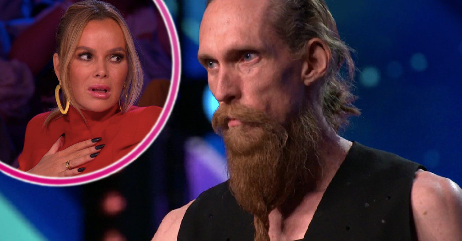 Amanda Holden looking scared with BGT 2023 act on the stage