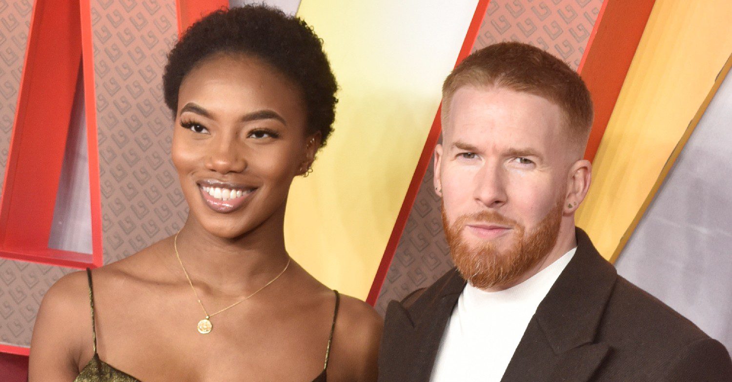 Chyna Mills and Neil Jones posing at an event