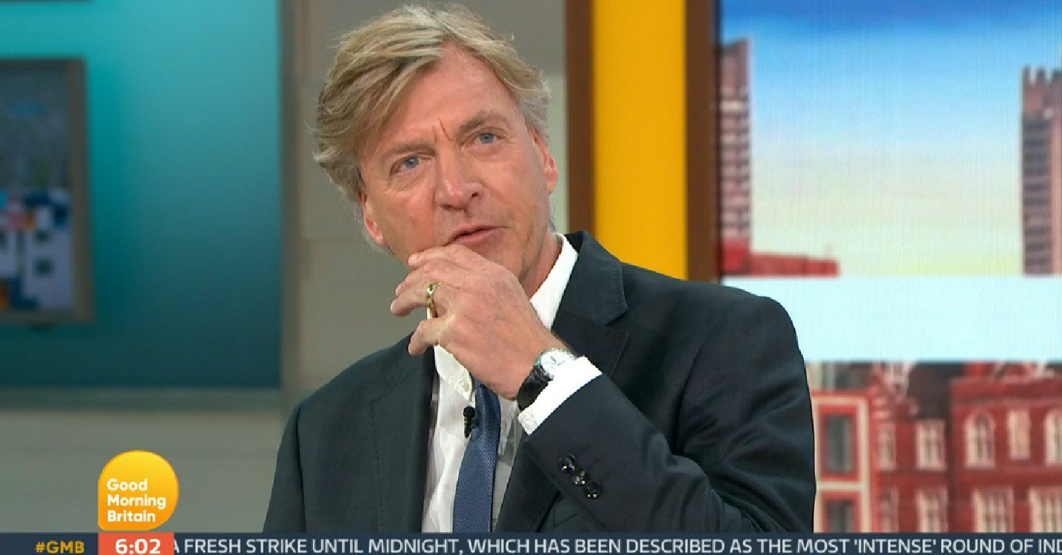 Richard Madeley talking with his hand by his face on GMB