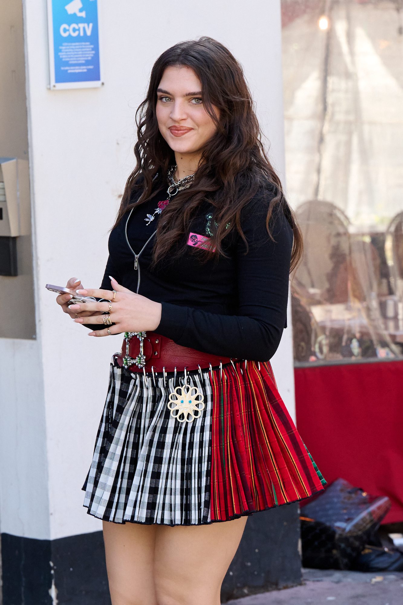 Eurovision hopeful Mae Muller on her phone