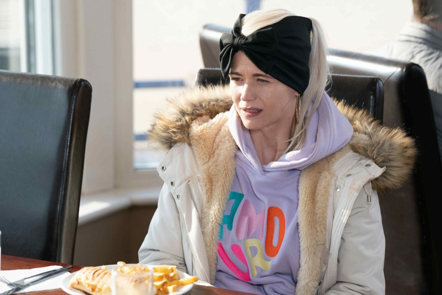 Lola outside on EastEnders, talking to Jay