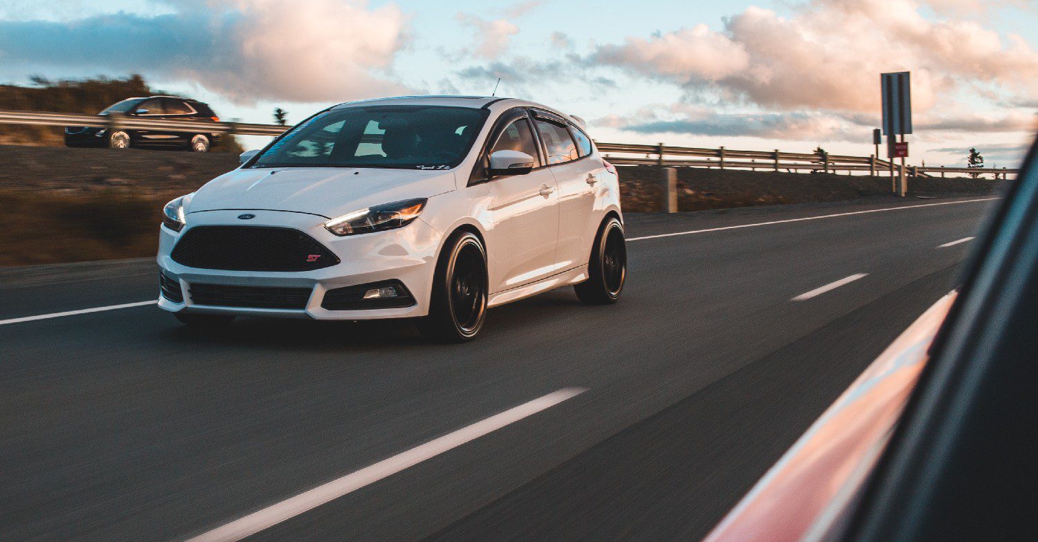 White car on the motorway 