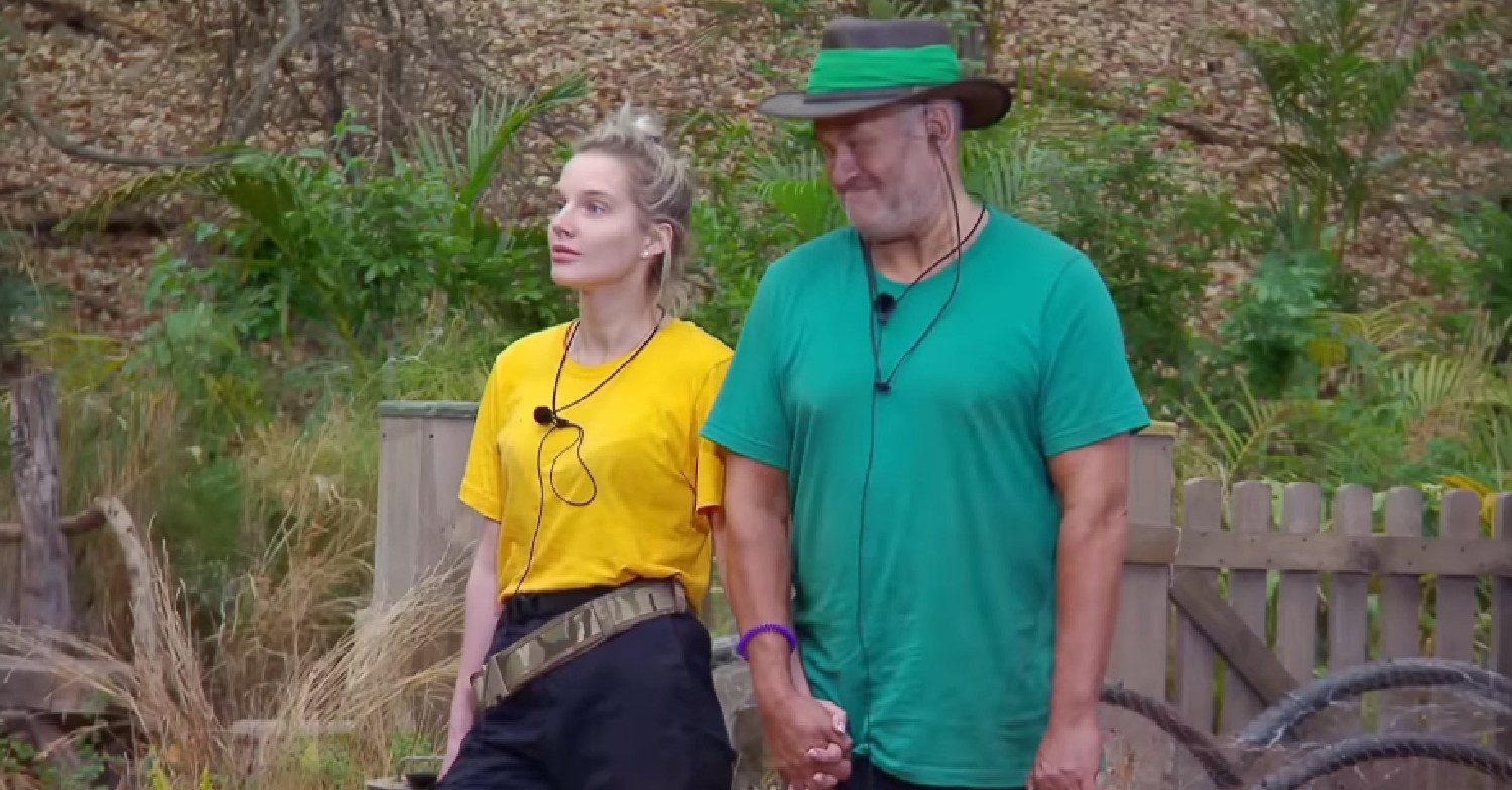 Helen Flanagan and Paul Burrell holding hands on I'm A Celebrity South Africa