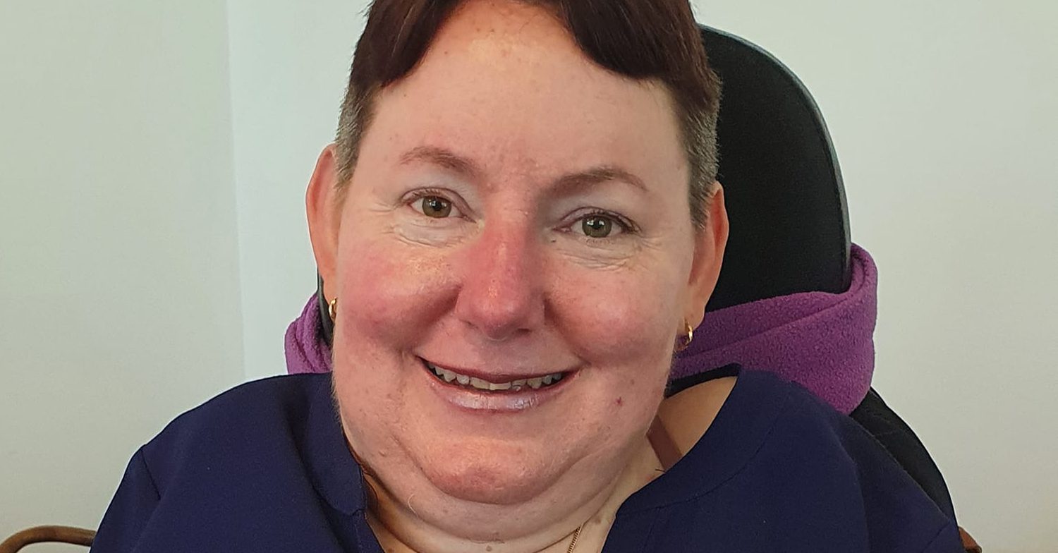 Melanie Hawkins smiles in photo