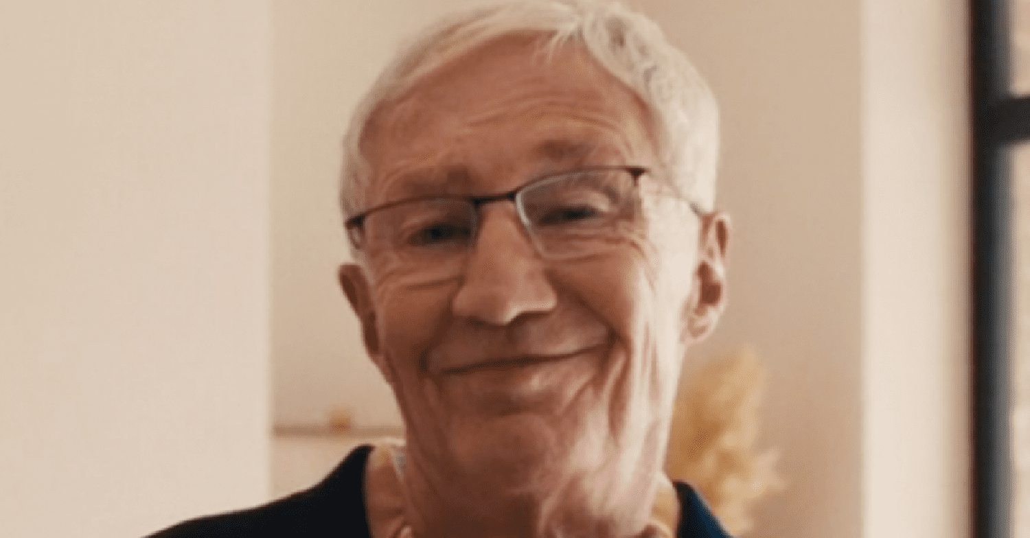 Paul O'Grady smiling on Eurovision
