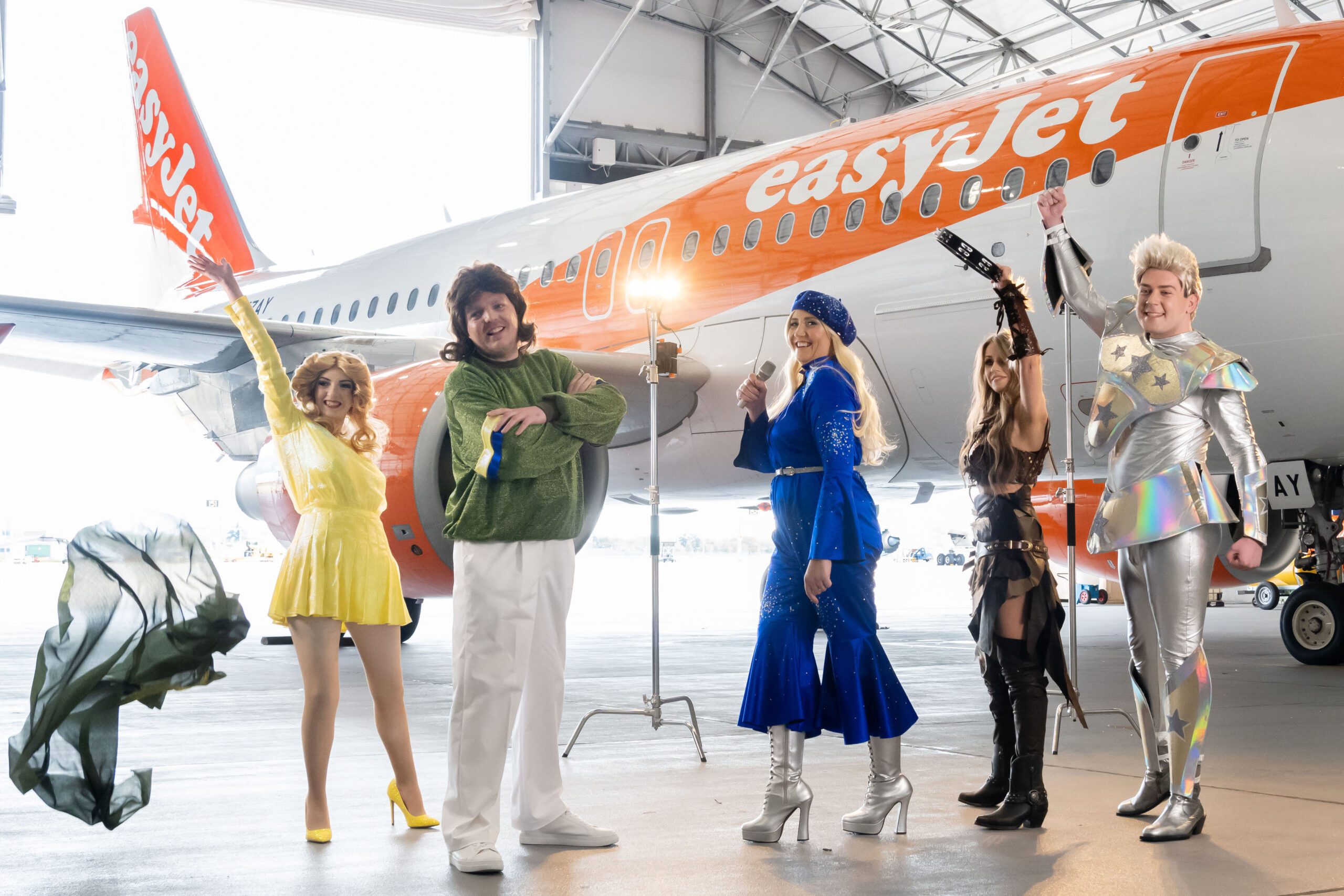 EasyJet crew members dressed as Eurovision stars