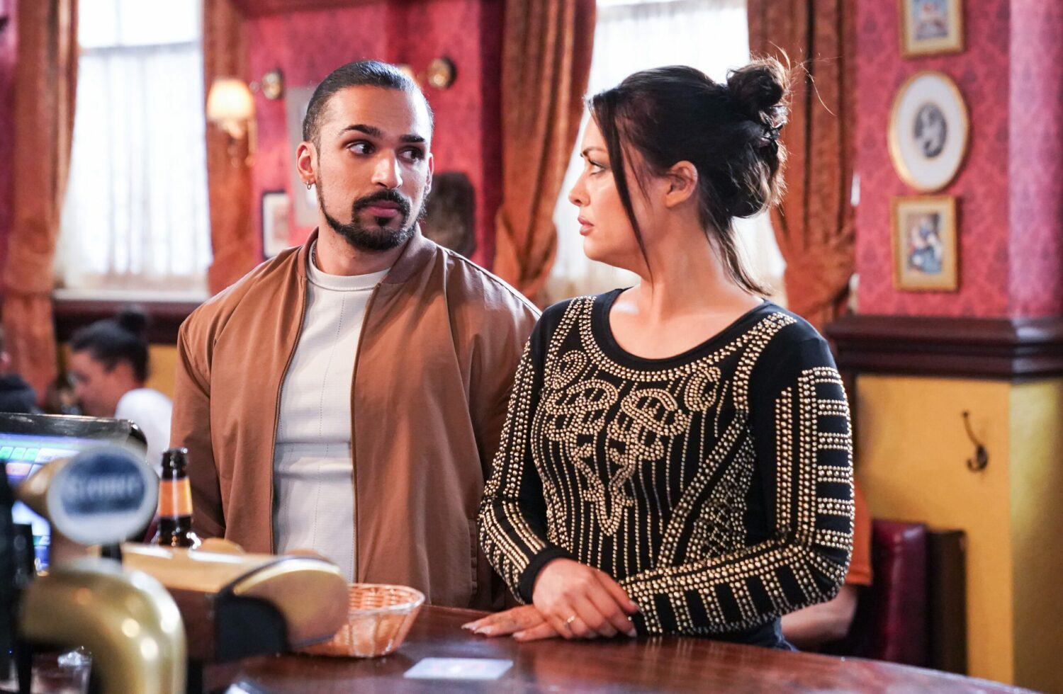 Ravi looks pleadingly at Whitney in EastEnders