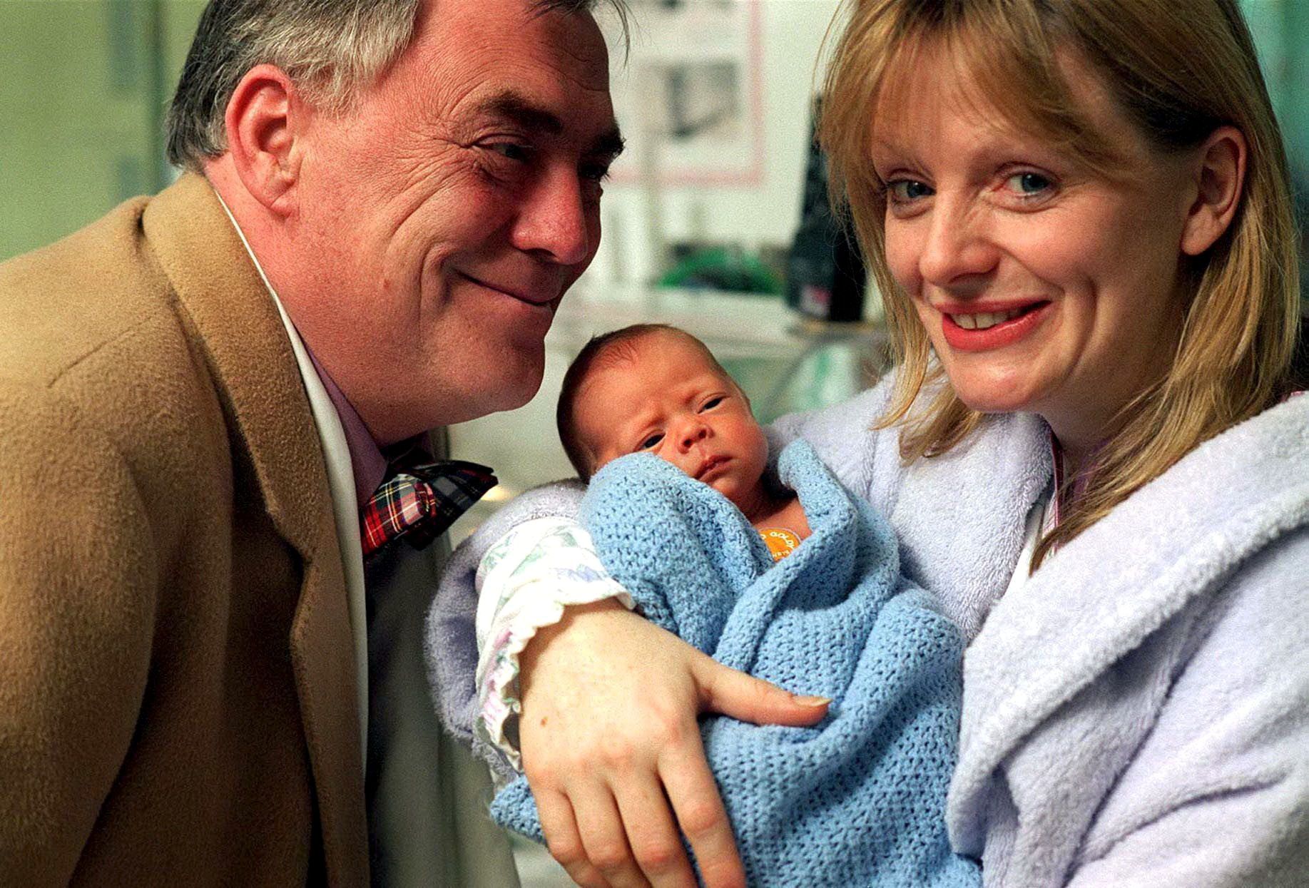 Jack Duckworth [William Tarmey], Tricia Armstrong [Tracy Brabin] and baby Brad