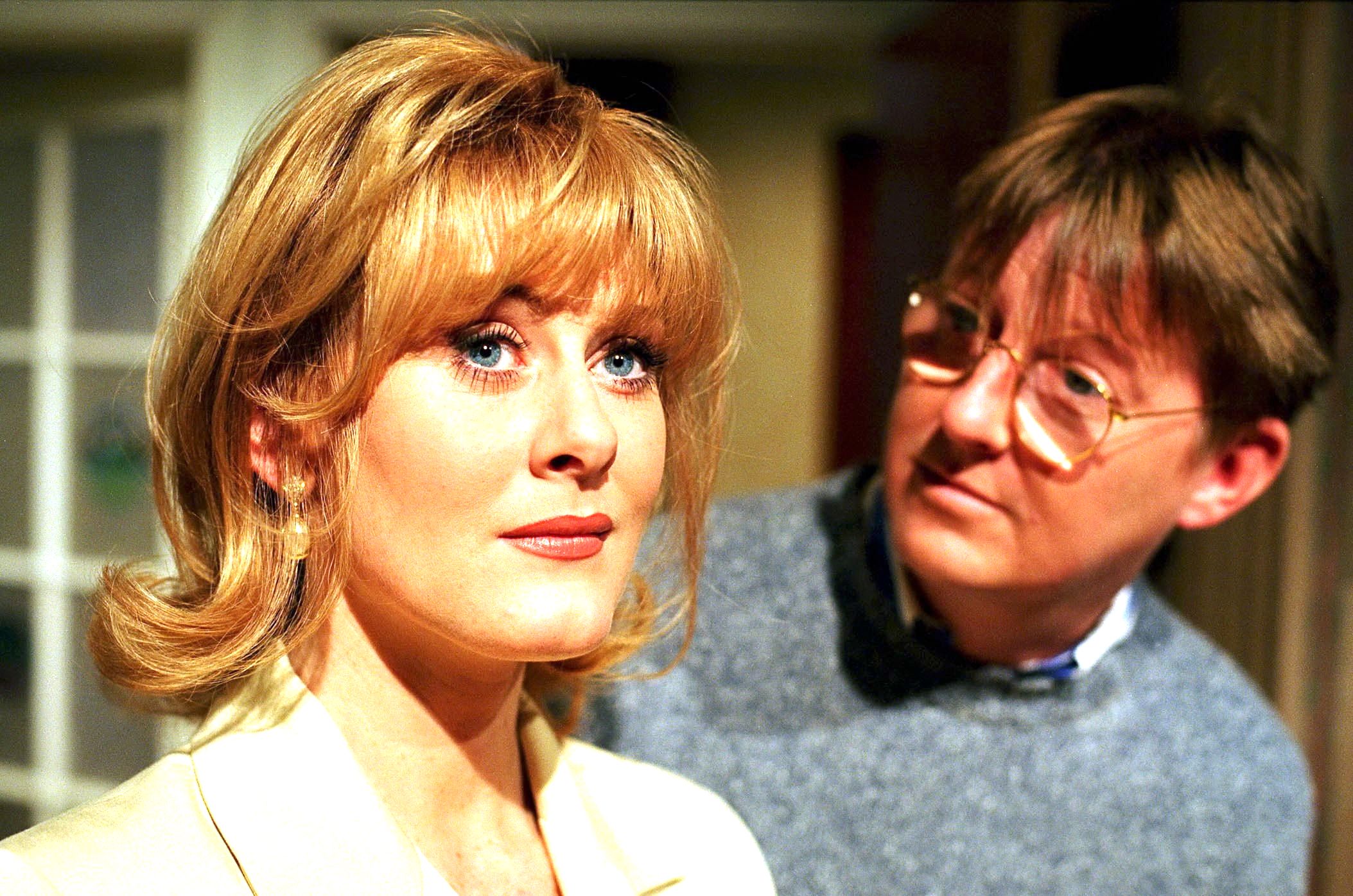 Curly is stunned when Raquel dresses sophisticated for an interview at a Manchester hotel in Coronation Street. Pictured: Ex-Coronation Street actress Sarah Lancashire with Kevin Kennedy