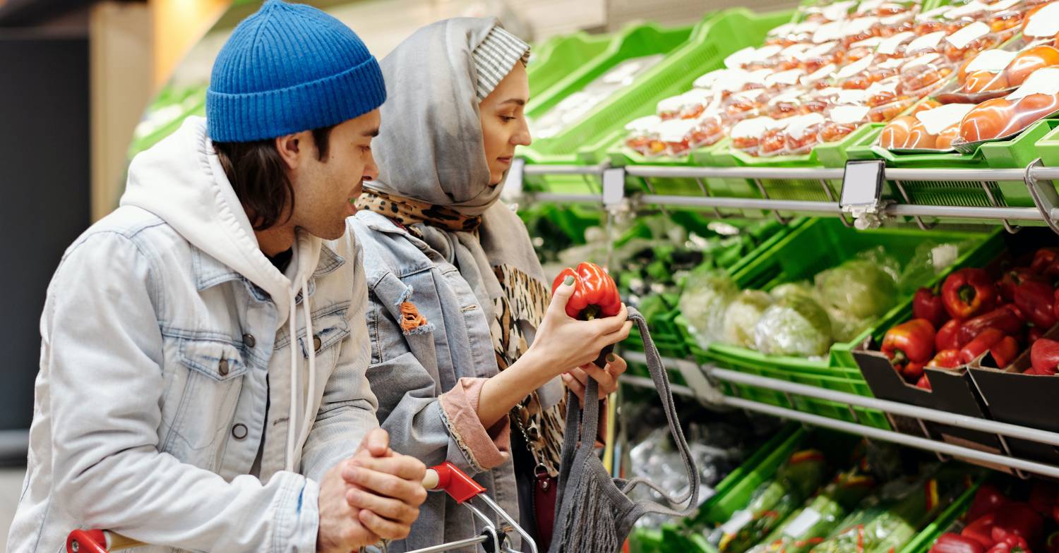 Couple shop at supermarket together