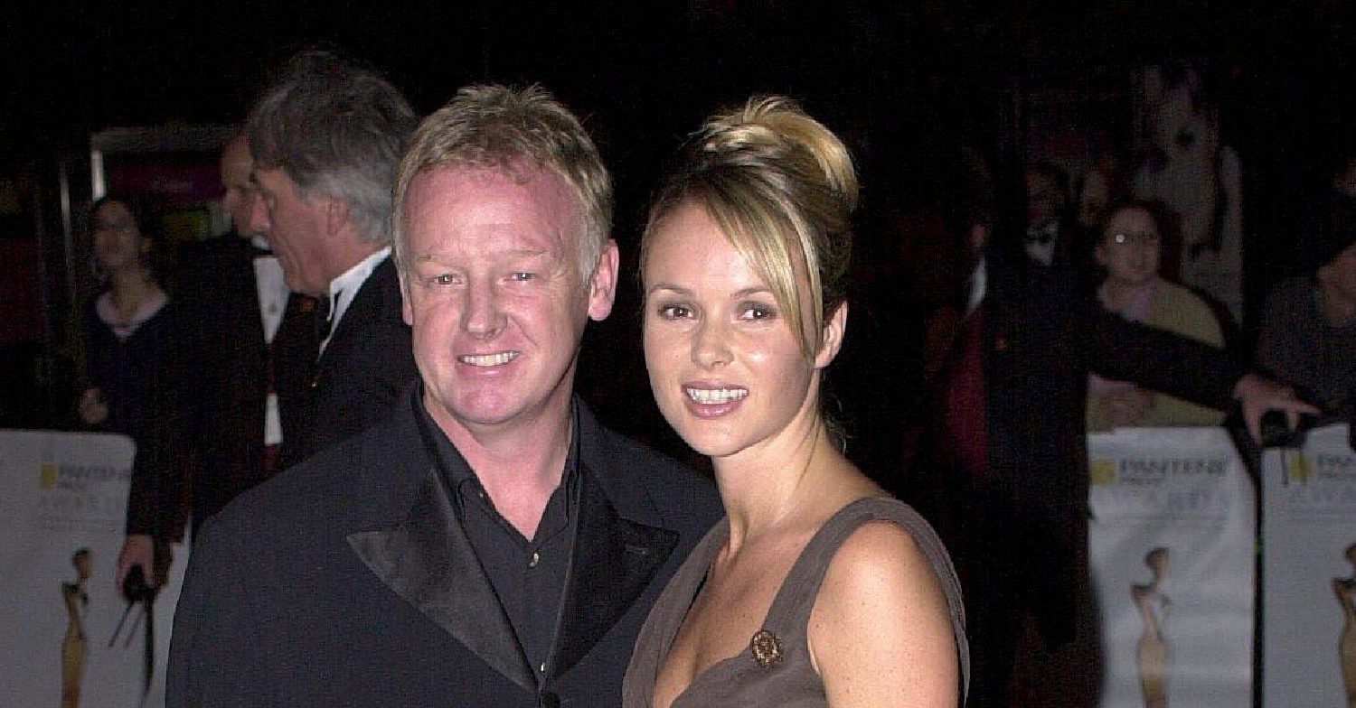 Amanda Holden and Les Dennis posing