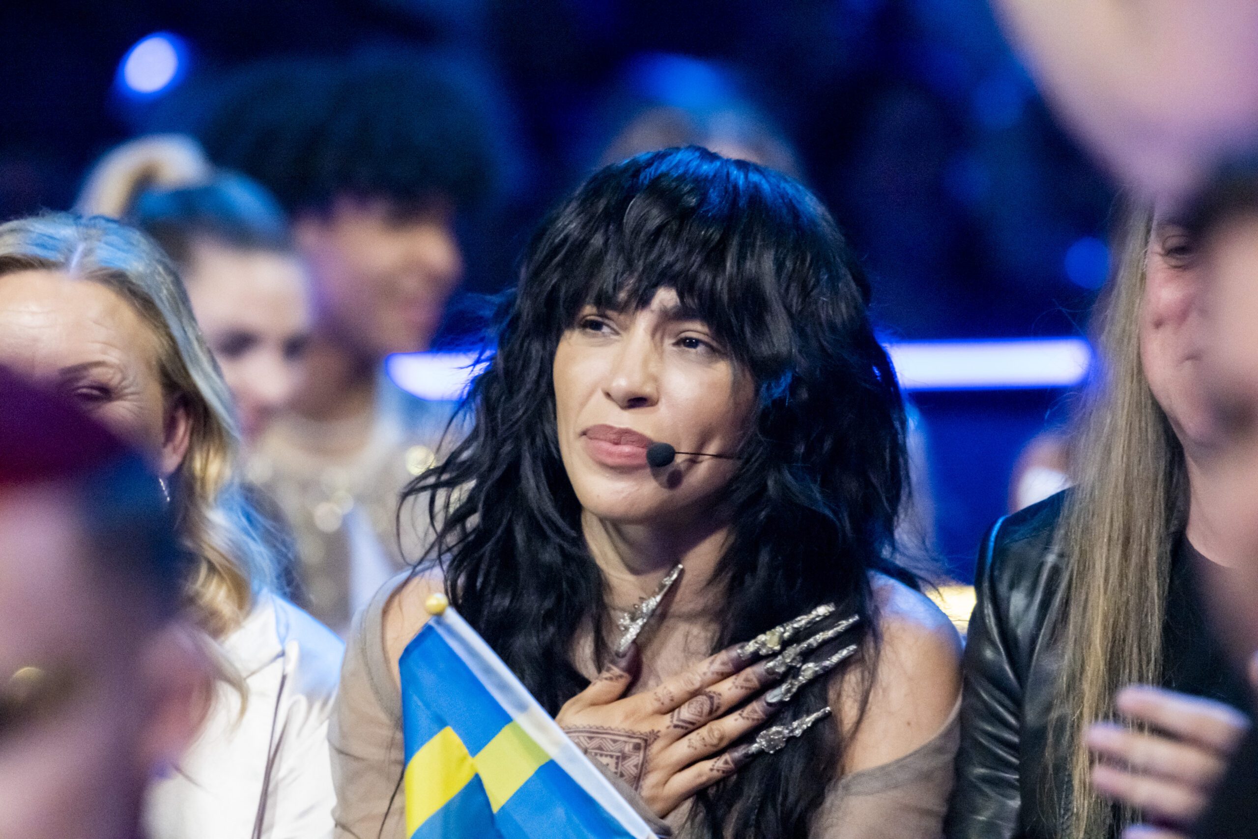 Loreen with a Sweden flag