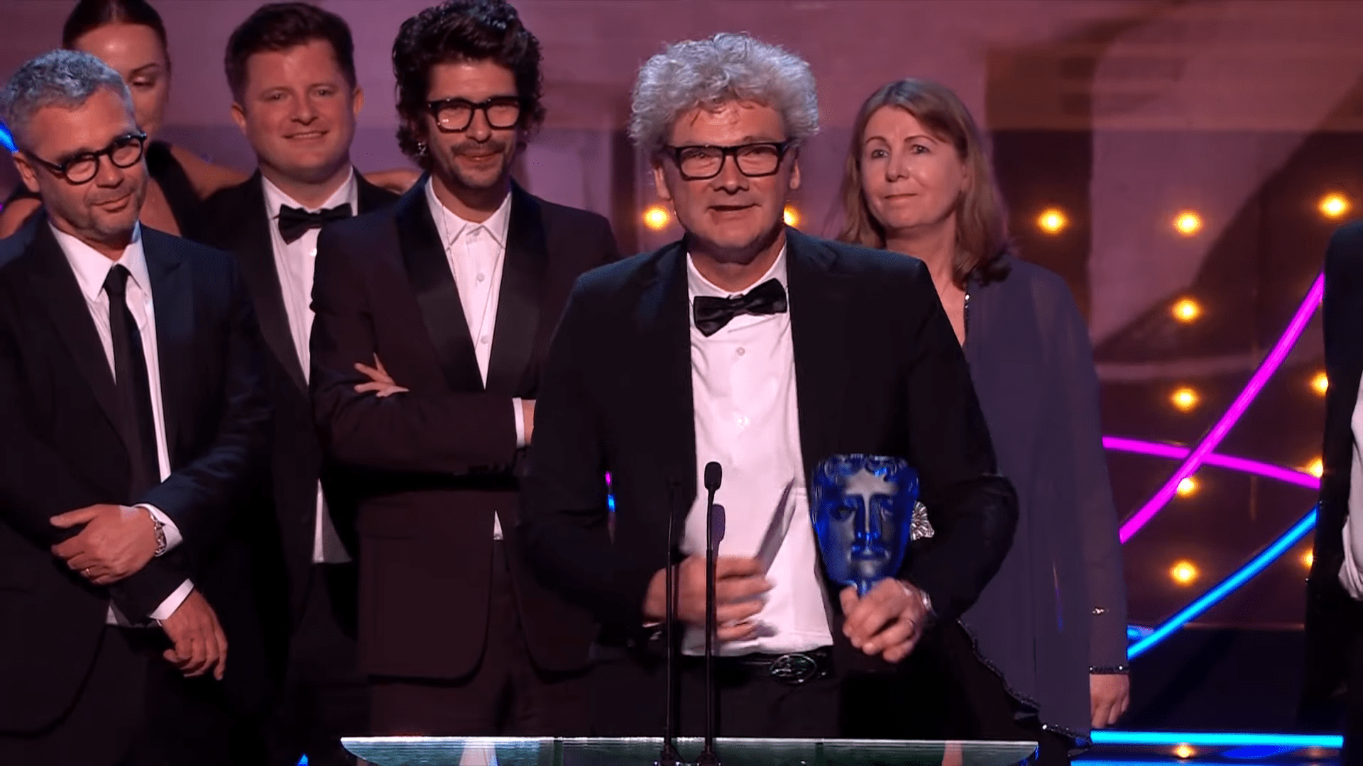 Simon Farnaby smiles at the 2023 TV BAFTAs