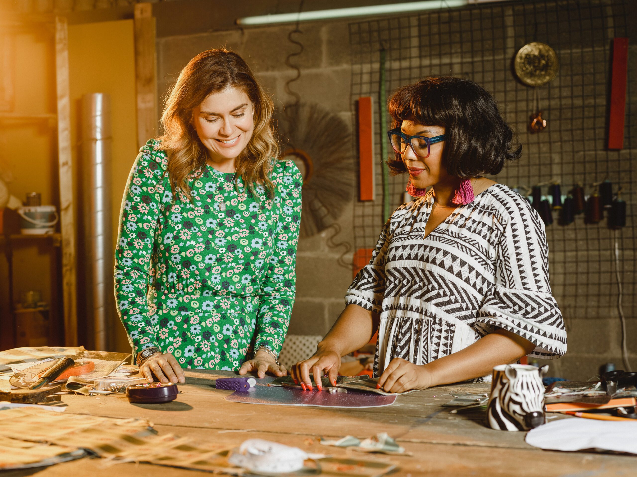 Amanda Lamb smiling inside of the Saved and Remade Workshop barn