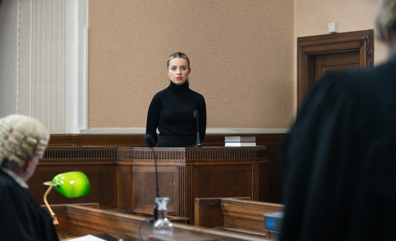 Daisy Midgeley looks nervous as she heads into the witness box in court