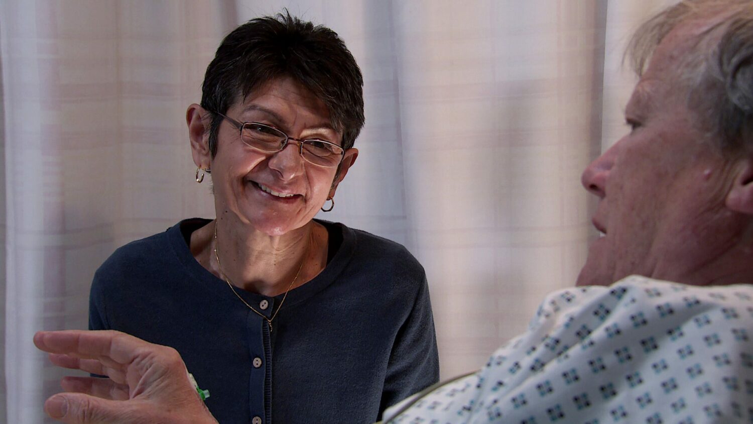 Corrie's Yasmeen smiling at Roy