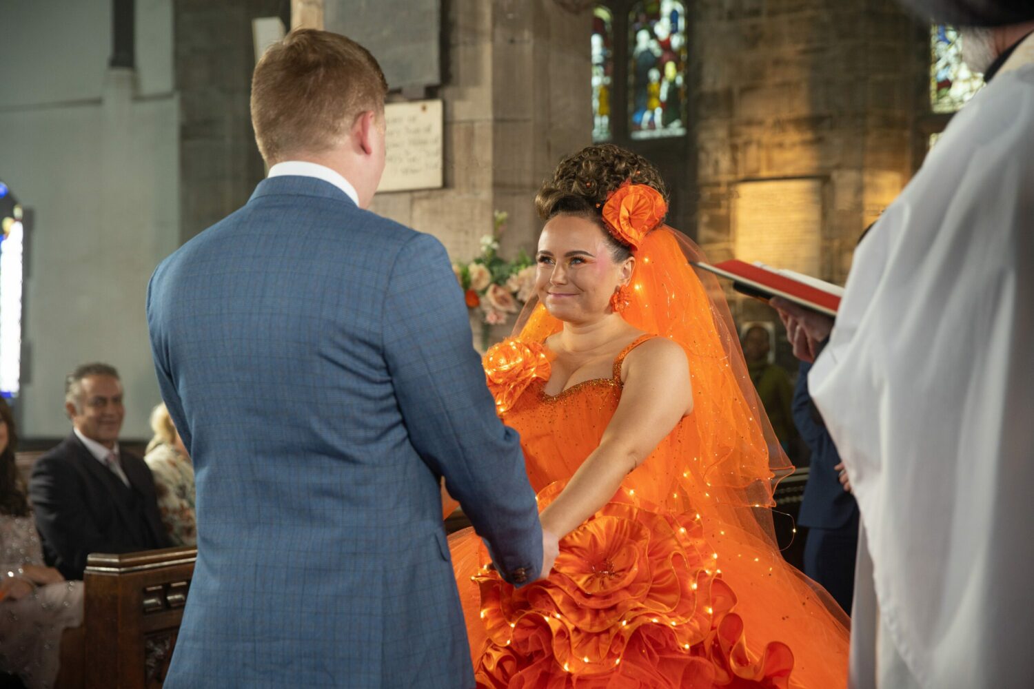 Coronation Street's Gemma and Chesney are holding hands at their wedding