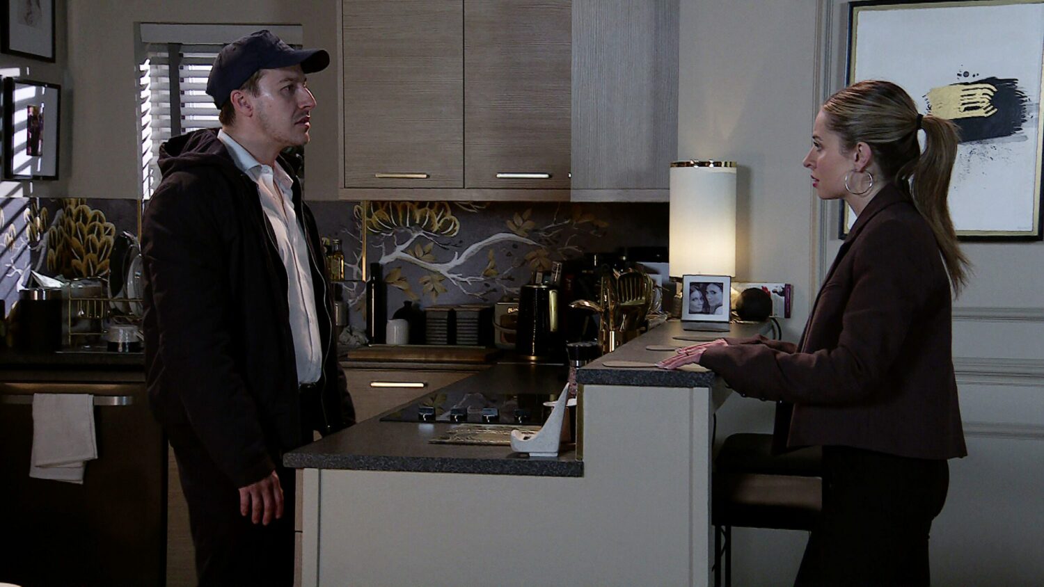 Ryan and Daisy look pleadingly at each other in Corrie