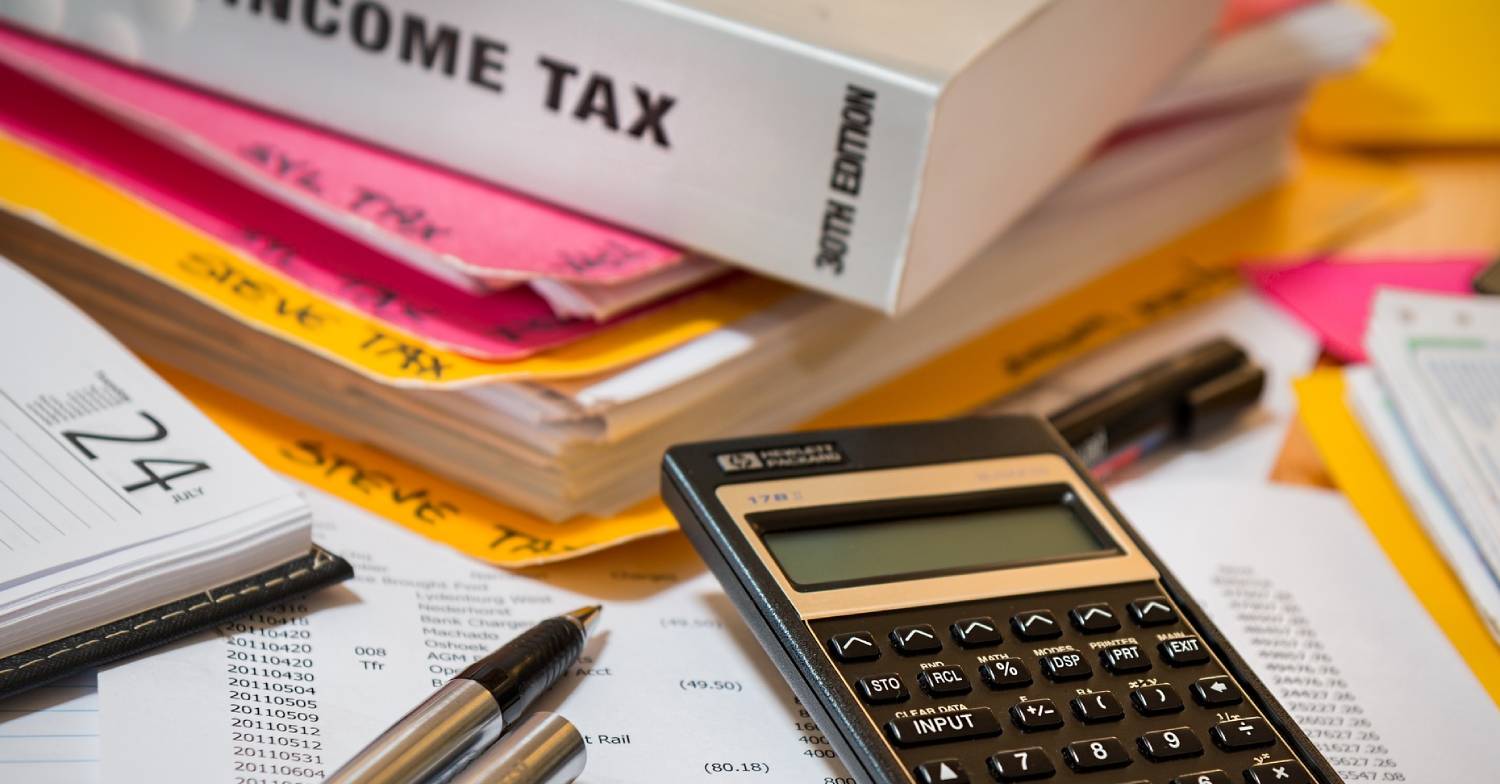 A book placed near a calculator