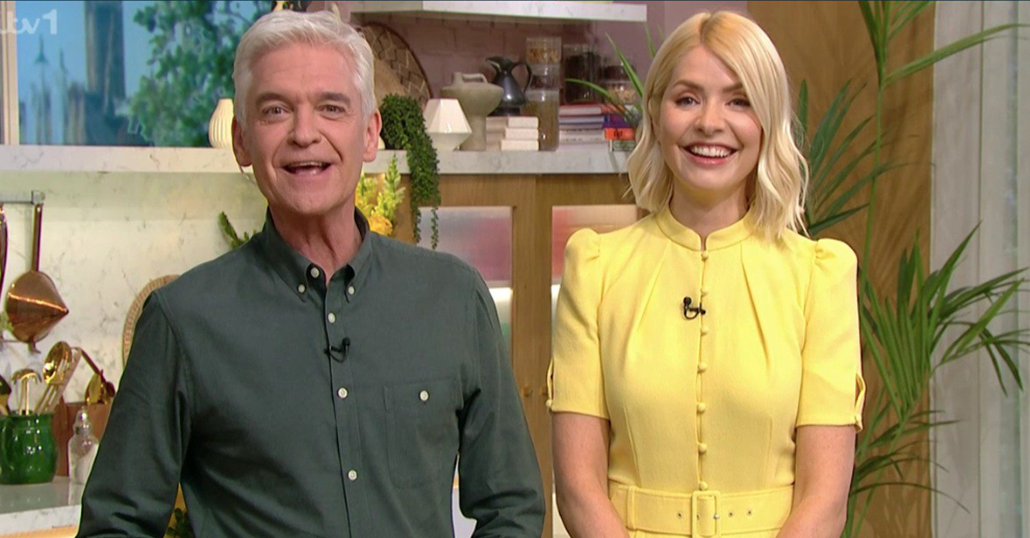 Phillip Schofield speaking as Holly Willoughby looks on on This Morning today
