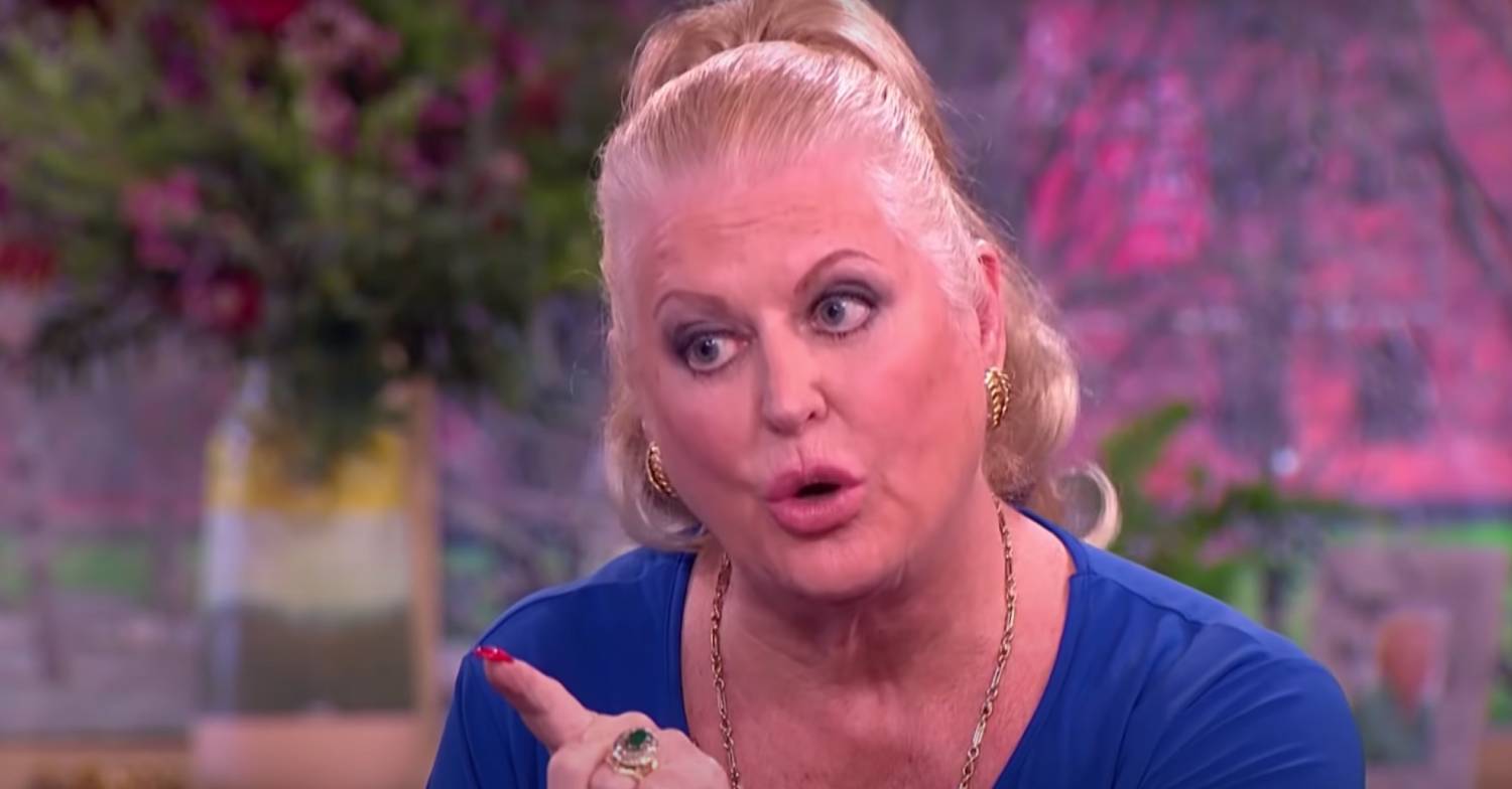 Kim Woodburn points a finger