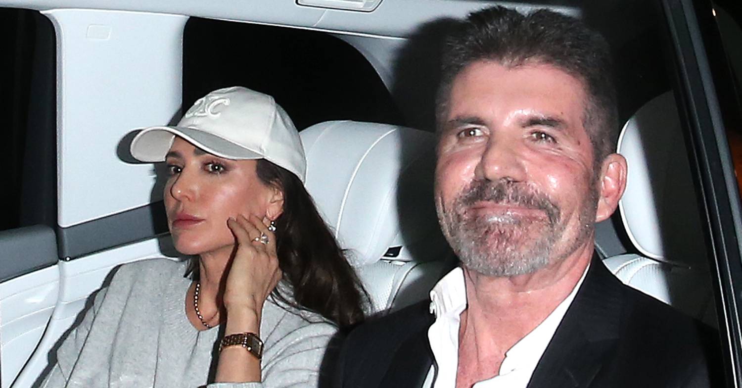 Simon Cowell smiles alongside Lauren Silverman