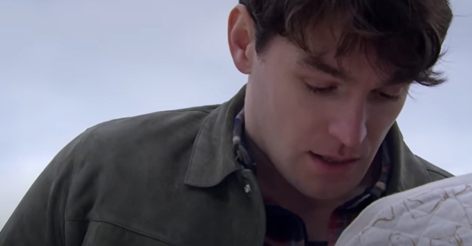 Emmerdale's Mack is holding baby Reuben