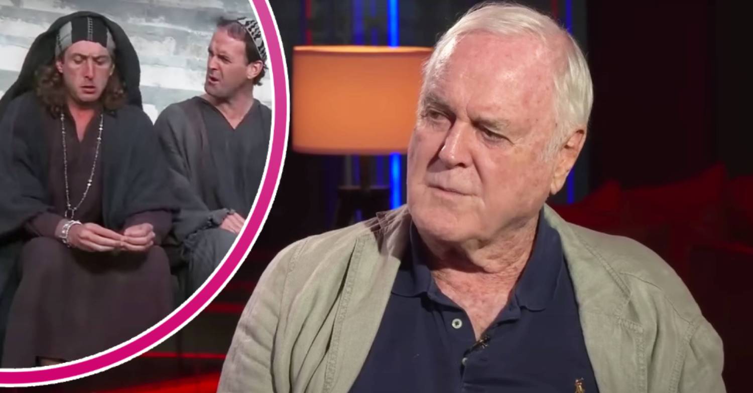 John Cleese looks to his side, a Life of Brian scene plays out