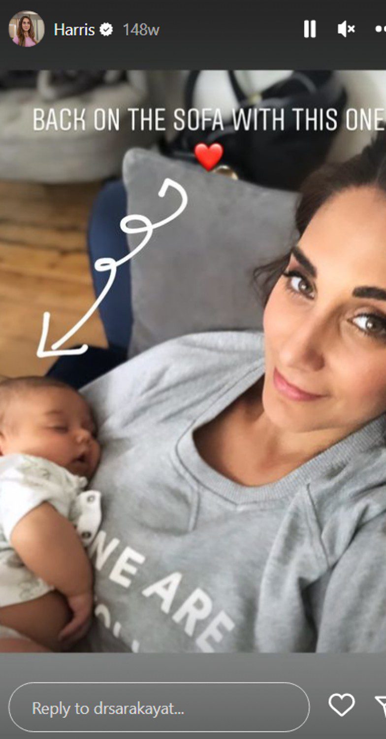 Dr Sara Kayat cuddling baby