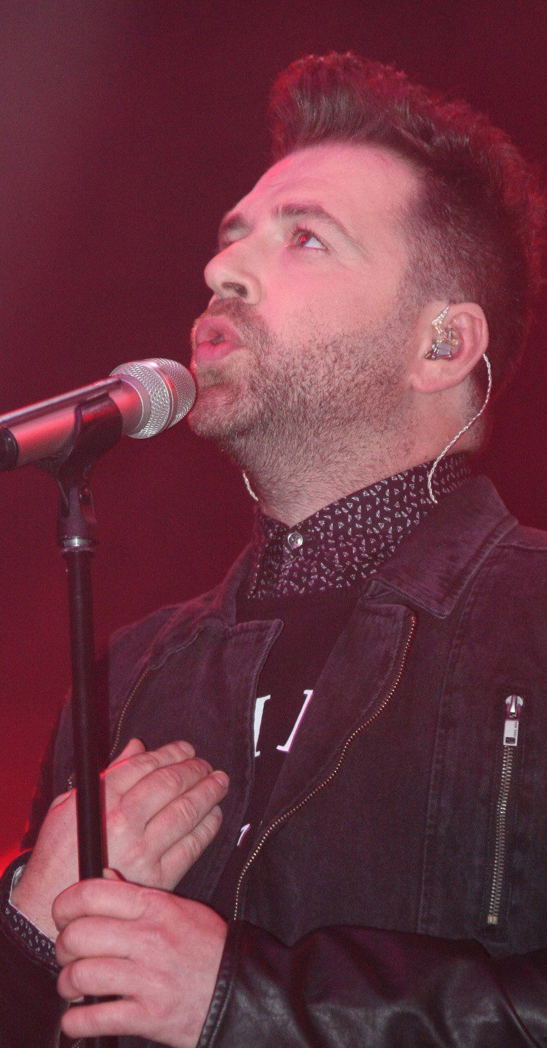 Mark Feehily singing on stage