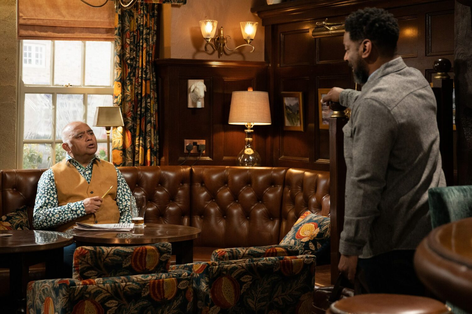 Emmerdale's Charles is talking to Rishi in the Woolpack