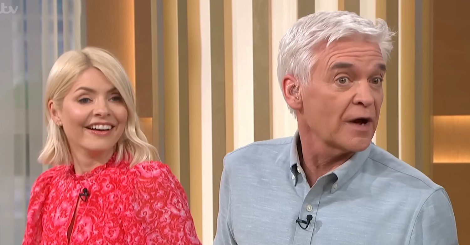Holly Willoughby smiles as Phillip Schofield looks surprised on This Morning
