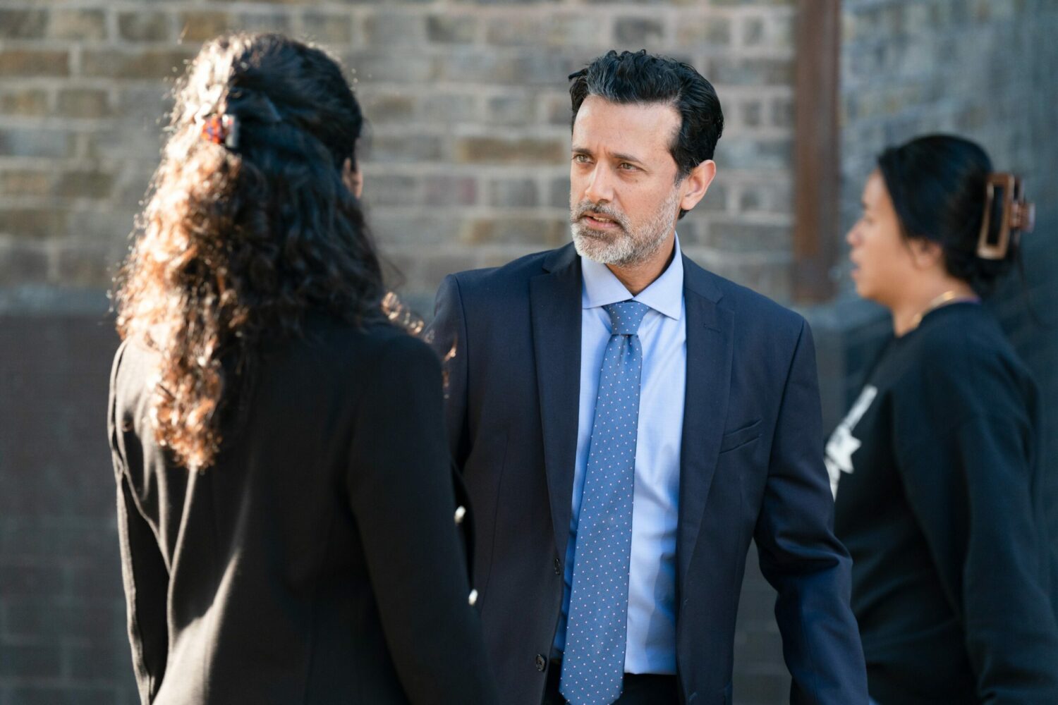 Nish talking to Suki on EastEnders