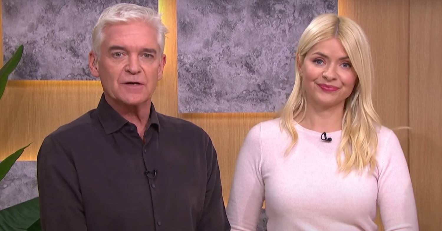 Phillip Schofield stands next to Holly Willoughby